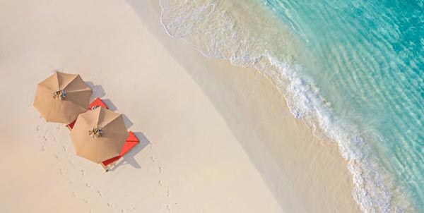 aerial-view-of-amazing-beach-with-umbrellas-and-lounge-chairs