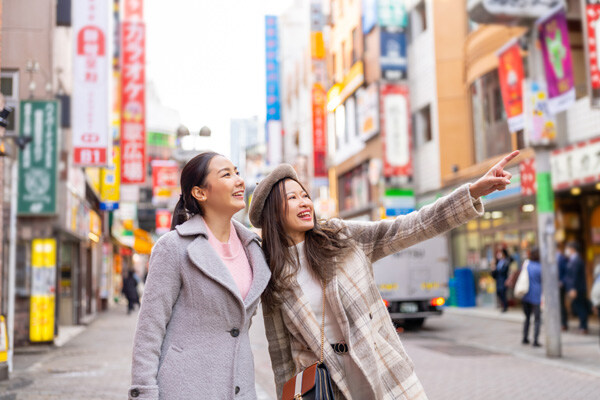 asian-woman-friends-shopping-together-at-shibuya-district--tokyo--japan
