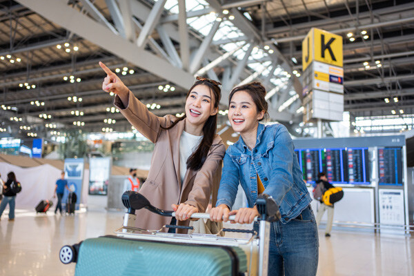 asian-young-women-passenger-walk-in-airport-terminal-to-boarding (1)