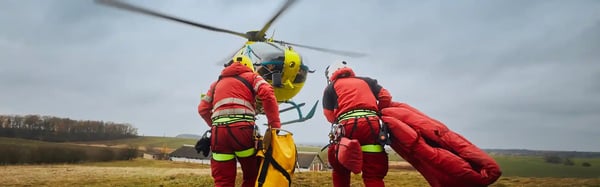 two-paramedic-with-safety-harness-and-climbing-equipment-running-to