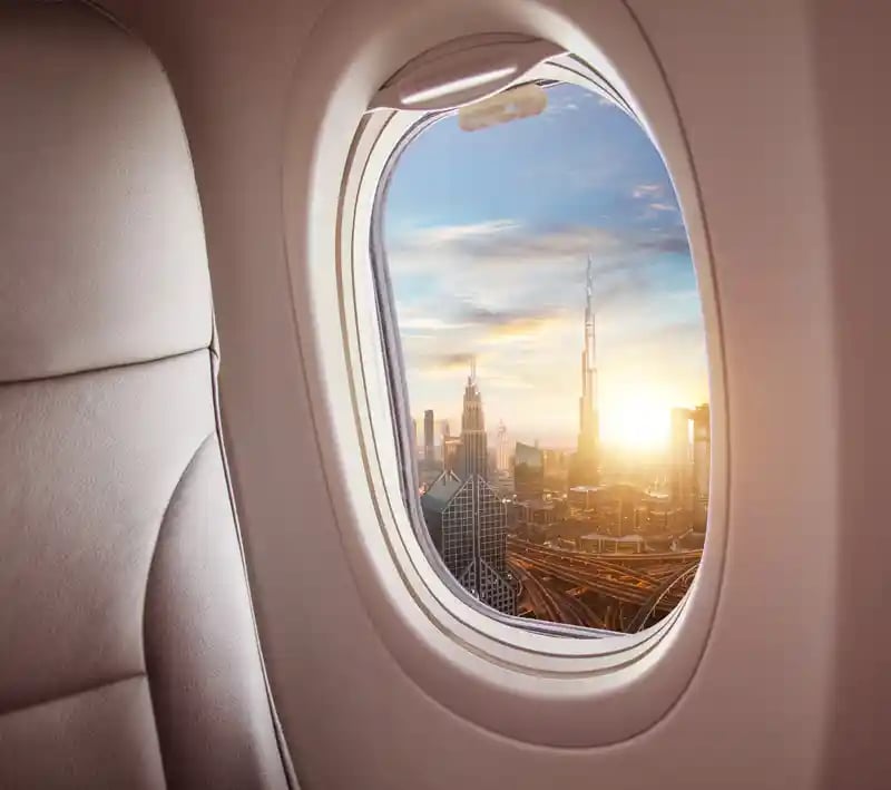 airplane-interior-with-window-view-of-dubai-city--uae-concept