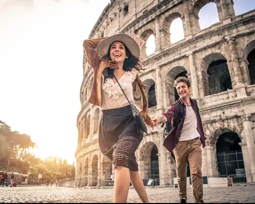 young-couple-at-the-colosseum--rome---happy-tourists-visiting