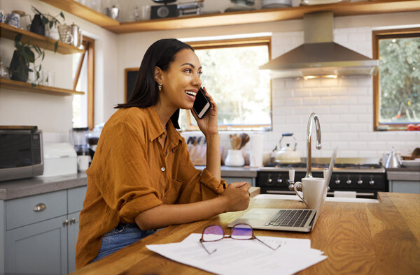woman--phone-call-and-remote-work-with-laptop--conversation-and