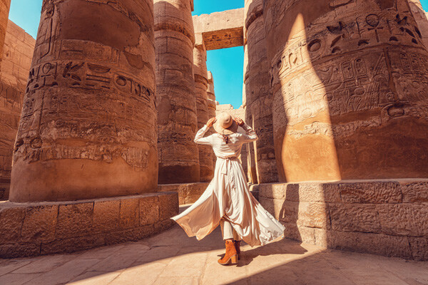 woman-traveler-explores-the-ruins-of-the-ancient-karnak-temple
