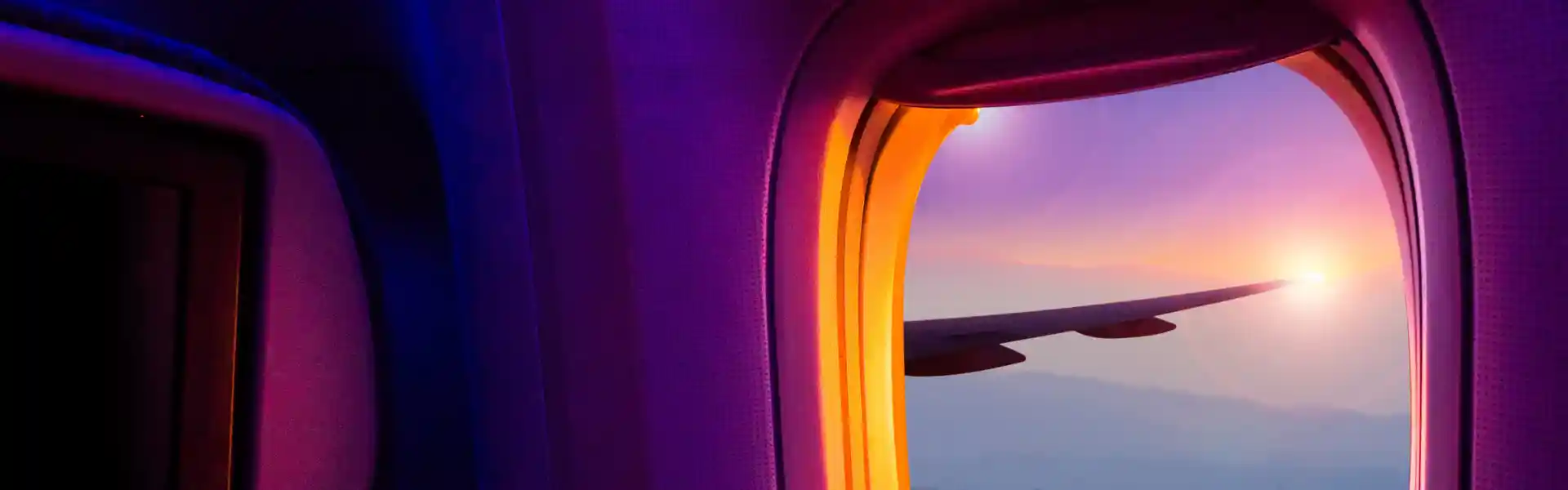 beautiful-scenic-city-view-of-sunset-through-the-aircraft-window