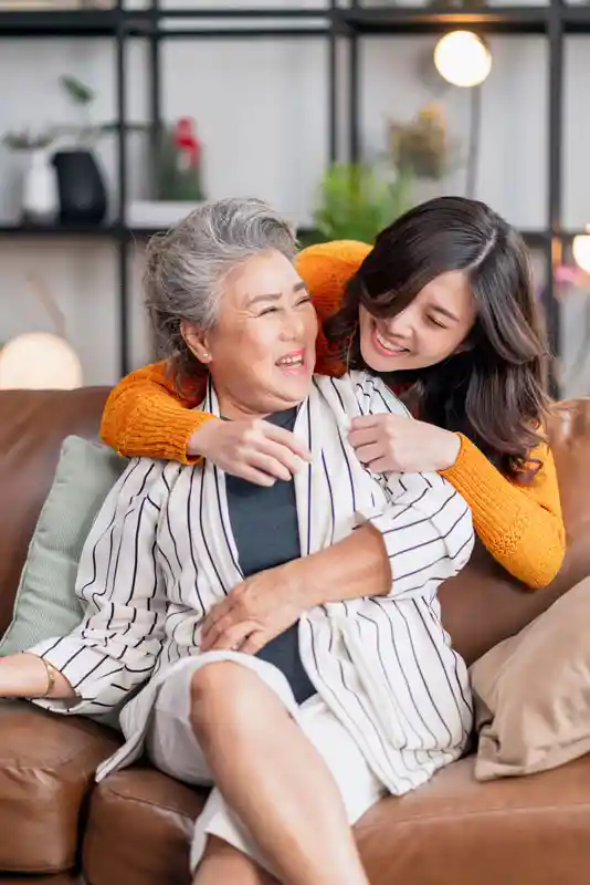 happiness-asian-family-candid-of-daughter-hug-grandparent-mother-senior