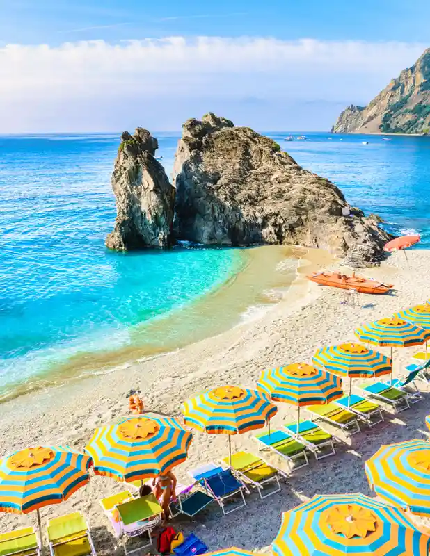 pebble-beach-of-monterosso-vacation-cinque-terre-monterosso-chairs-and