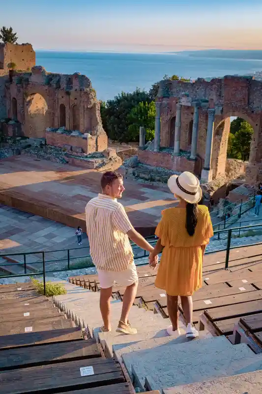 taormina-sicily--couple-watching-sunset-at-the-ruins-of-the